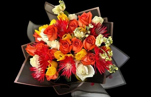 Mix of Roses and other seasonal Flowers
